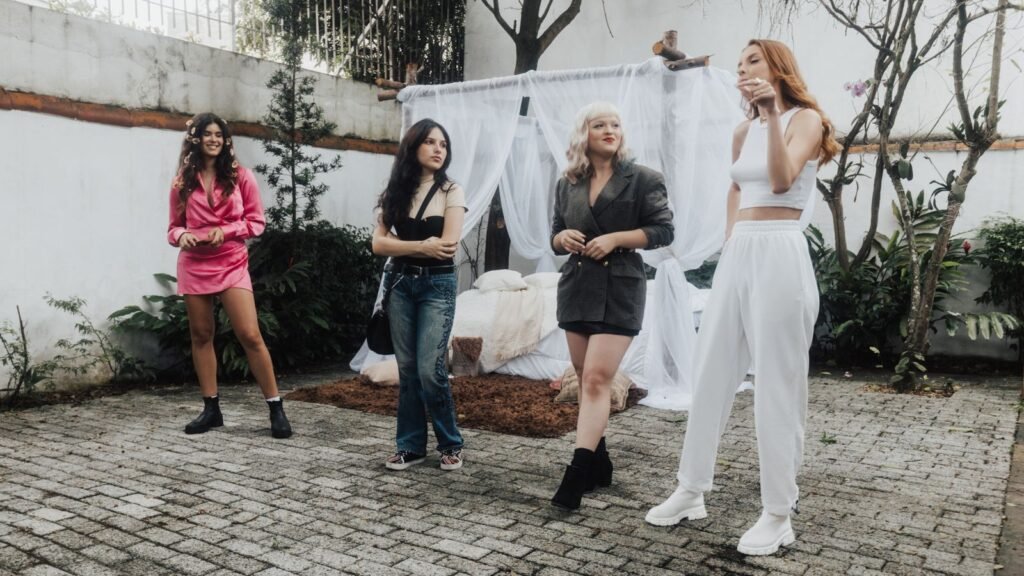 Group of women in different fashionable outfits representing varied body types
