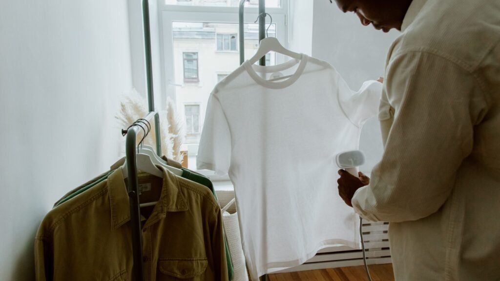 steaming a shirt to remove wrinkles while traveling